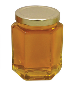 [A0302] 20 OZ (1.25 LB) OF WILD-FLOWER RAW HONEY IN A HEXAGONAL GLASS JAR 