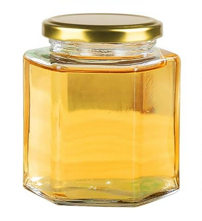 [A0308] 37 OZ (2.3 LB) OF WILD-FLOWER RAW HONEY IN A HEXAGONAL GLASS JAR 